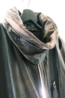 Issey Miyake FW1992 ‘Neck-Pillow’ Leather Jacket with Concealed Hood.