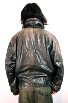 Issey Miyake FW1992 ‘Neck-Pillow’ Leather Jacket with Concealed Hood.